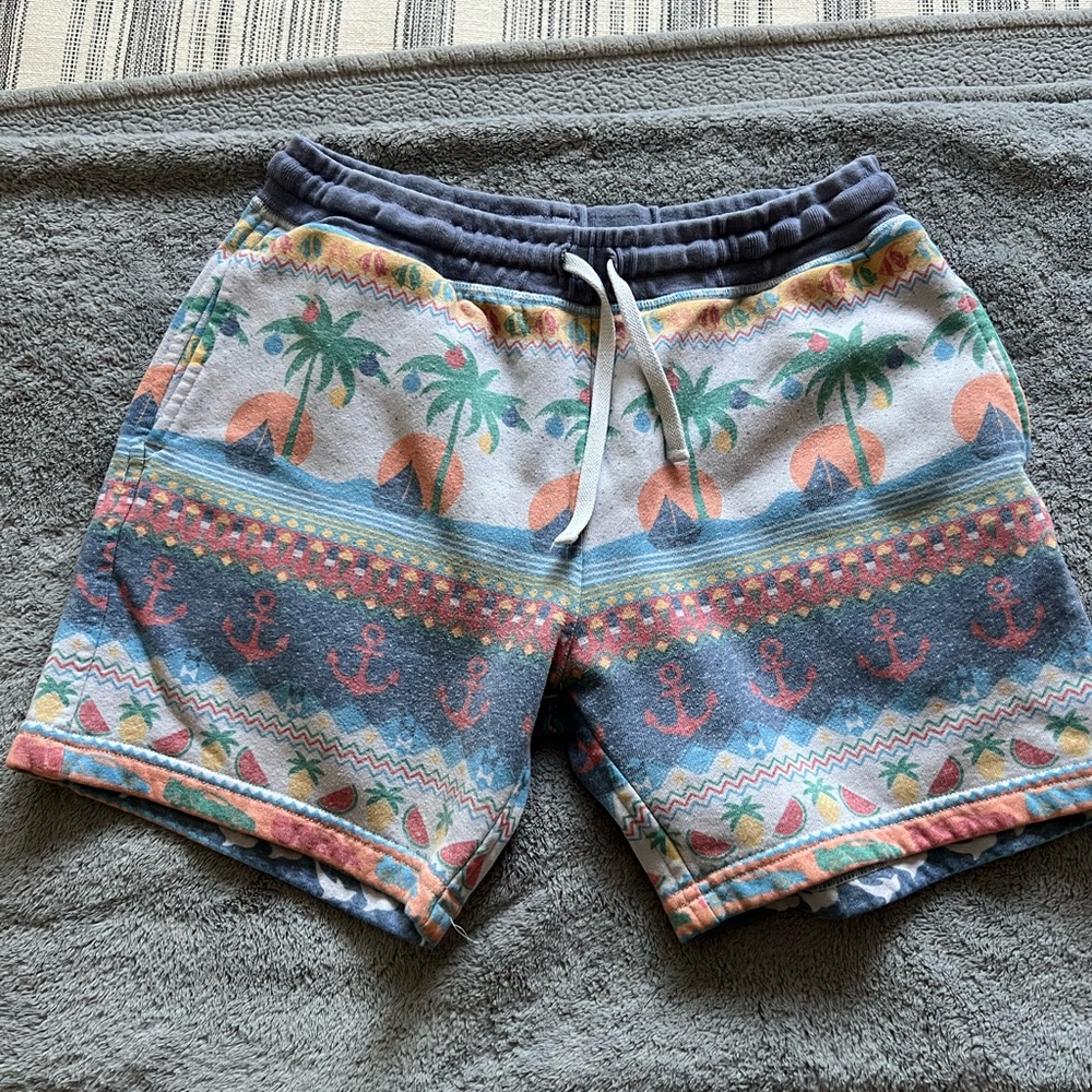chubbies Tropical Palm & Anchor Swim Trunks in Blue and Coral